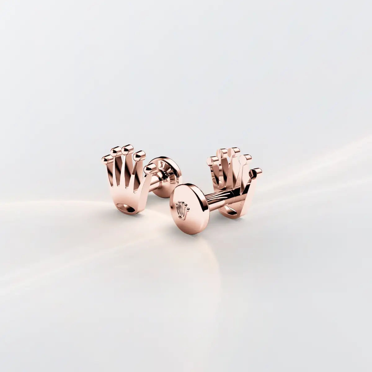 Rolex 'Crown' cufflinks in Everose gold, A1015 at Henne Jewelers