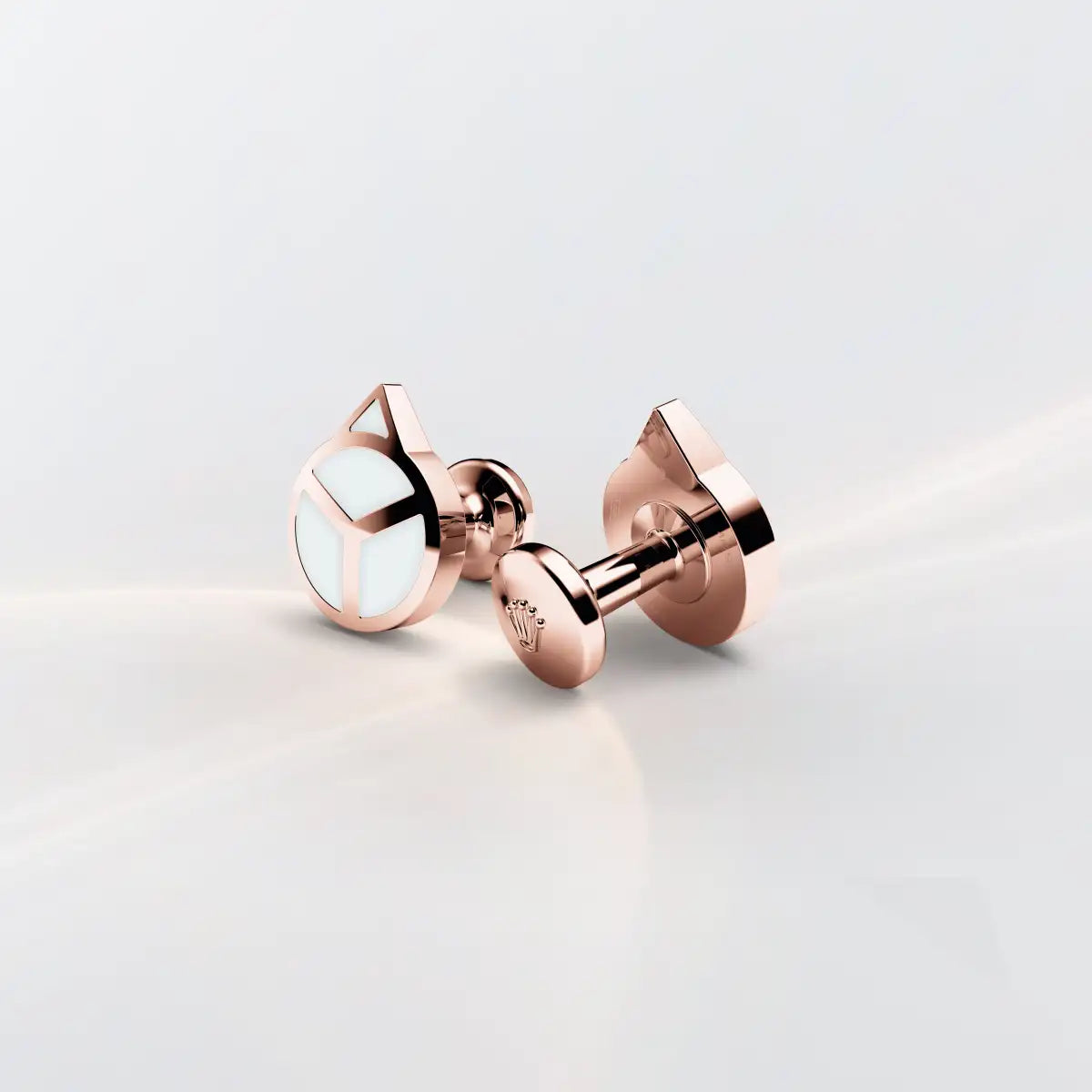 Rolex 'Hand' cufflinks in Everose gold and luminescent material, A1025 at Henne Jewelers