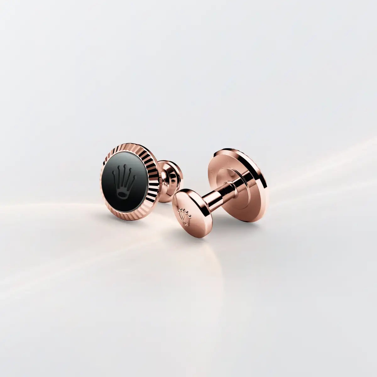 Rolex 'Fluted' cufflinks in Everose gold and ceramic, A1035 at Henne Jewelers