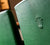 Close Up of Green Chair Backs with the Rolex Logo