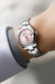 Close Up of Woman's Wrist Wearing Rolex Date Just 31 with Oystersteel Case, Oyster Bracelet and Pink Dial 